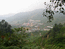 Вид на окружающие горы по центру, если стоят спиной к главному зданию.